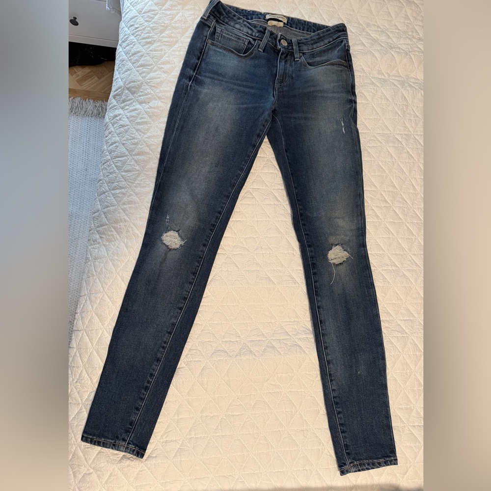 Blue Skinny Jeans with Distressed Details